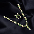 Elegant Pearl & Green Leaf Jewelry Set – Necklace and Earrings
