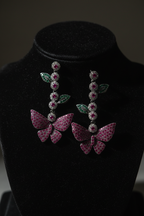 Pink Butterfly Garden Drop Earrings – dark velvet luxury editorial promotional image