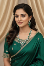 Bridal lifestyle — model wearing white AD and emerald green mixed-cut cluster graduated necklace set