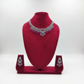Fuchsia pink AD floral fringe necklace set on burgundy velvet display