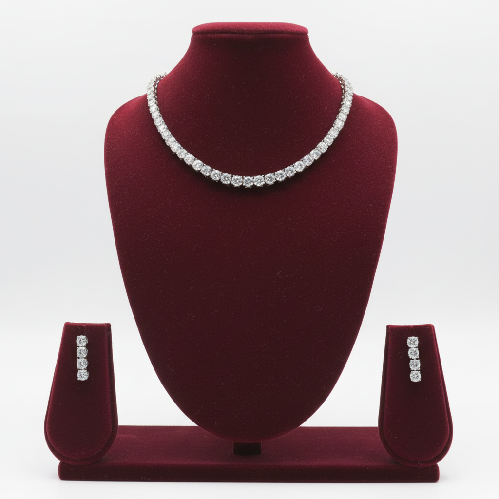 White AD round brilliant graduated tennis necklace set with stud earrings on burgundy velvet display