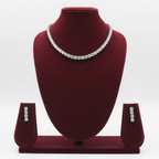 White AD round brilliant graduated tennis necklace set with stud earrings on burgundy velvet display
