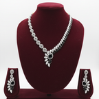Black onyx leaf AD necklace set on burgundy velvet display