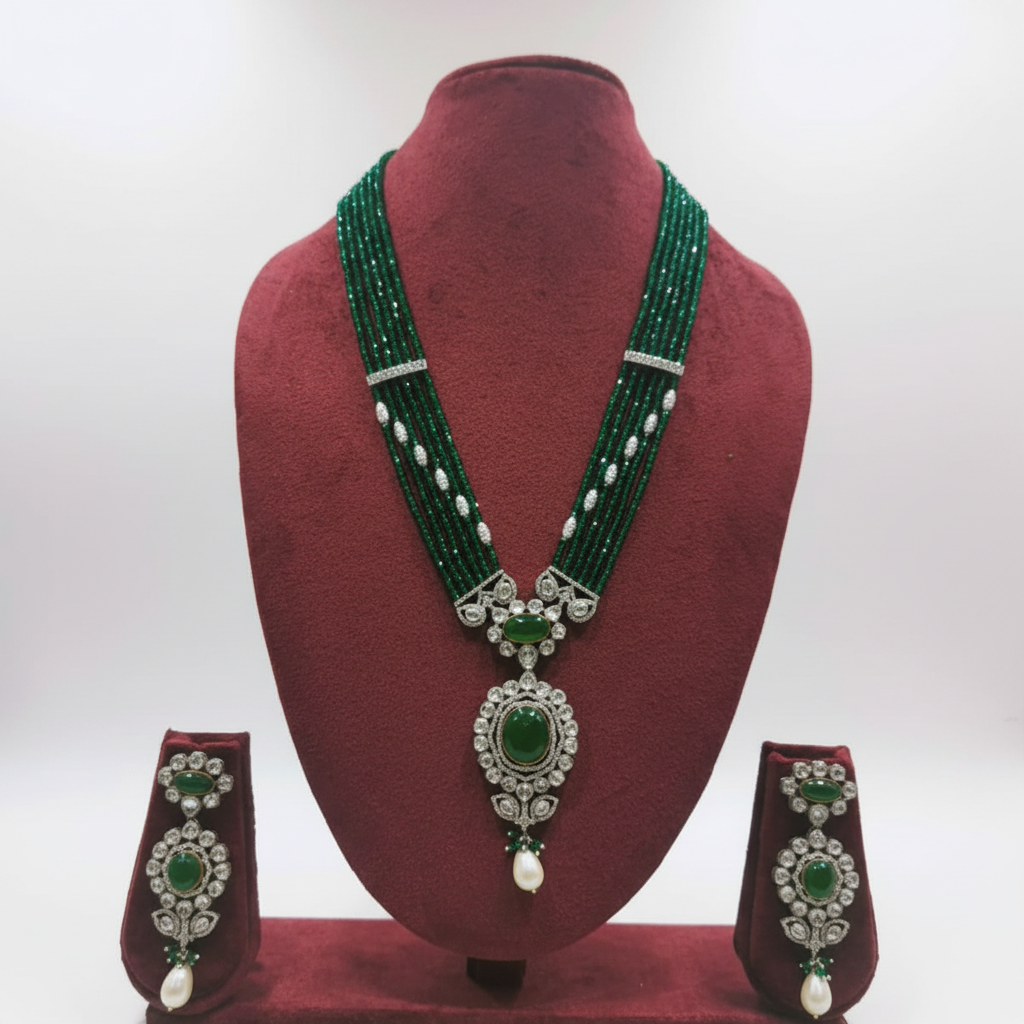 Emerald bead and pearl polki AD jade pendant long necklace set on burgundy velvet display