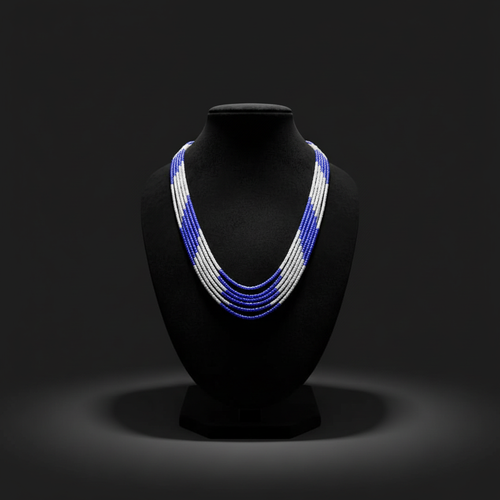 5-strand blue and white seed bead necklace on dark velvet studio display