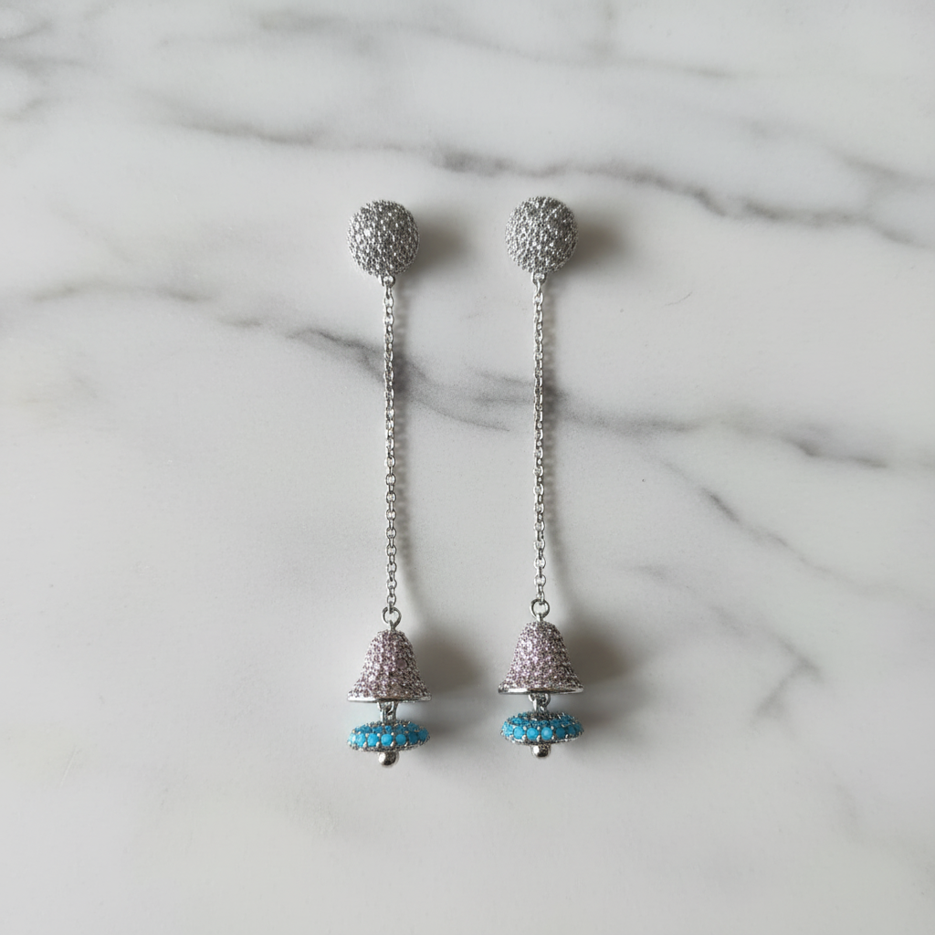 Silver CZ Jhumka Earrings – luxury flat lay on marble