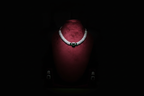 Emerald triple-stone AD pave disc necklace set promotional banner on black background