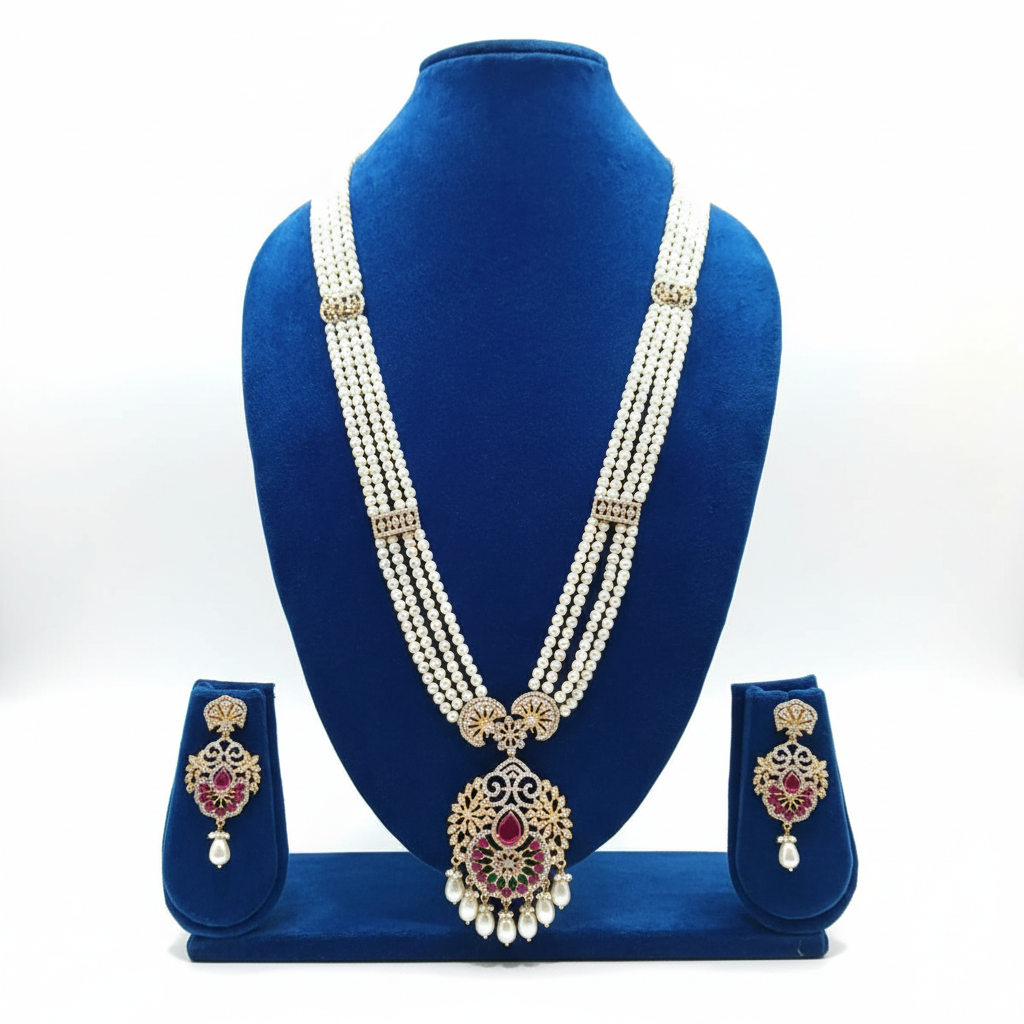 Pearl and ruby AD medallion long necklace set on navy velvet display