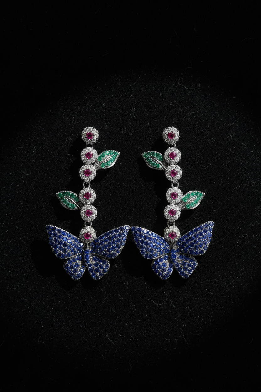 Blue Butterfly Garden Drop Earrings – dark velvet luxury editorial promotional image
