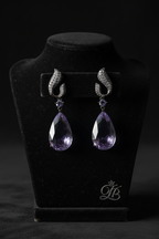 Violet Mist Wave Teardrop Drop Earrings – dark velvet luxury editorial promotional image