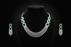 Emerald multi-strand AD necklace set promotional banner on black background