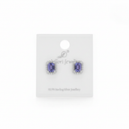 92.5 Sterling Silver Tanzanite Blue Rectangular Halo Stud Earrings studio product shot