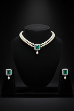 2-strand seed pearl choker with emerald square AD pendant on dark velvet studio display