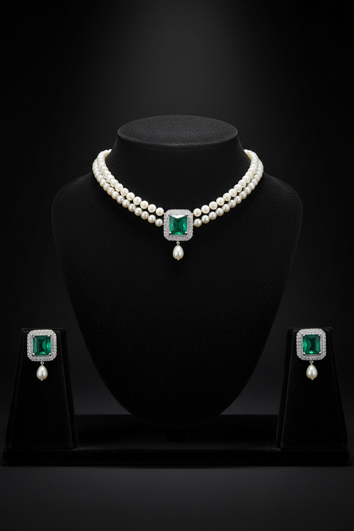 2-strand seed pearl choker with emerald square AD pendant on dark velvet studio display