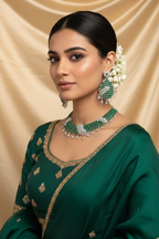 Bridal lifestyle — model wearing emerald green and white AD pave twisted rope choker necklace set