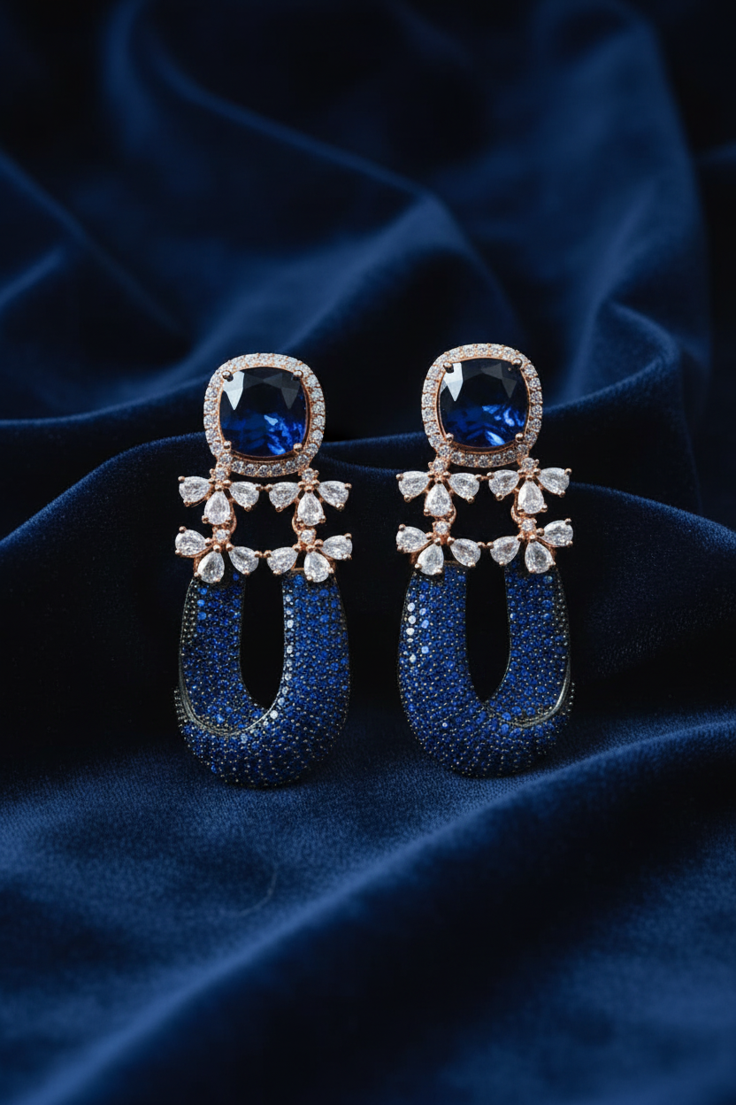 Royal Blue Sapphire Horseshoe Drop Earrings - editorial lifestyle shot