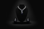 Sapphire blue floral AD necklace set promotional banner on black background