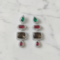 Emerald Ruby Smoky Topaz CZ Chandelier Earrings – luxury flat lay on marble