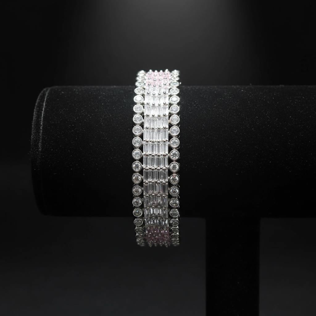 All-white baguette AD bangle with round polki AD border on dark velvet studio display