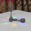Multicolour CZ Lotus Jhumka Earrings – luxury flat lay