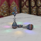 Multicolour CZ Lotus Jhumka Earrings – luxury flat lay