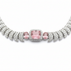 Close-up macro of AD pave discs and rose pink cushion-cut stones
