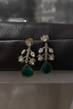 Polki Botanical Vine Emerald Drop Earrings – dark velvet luxury editorial promotional image