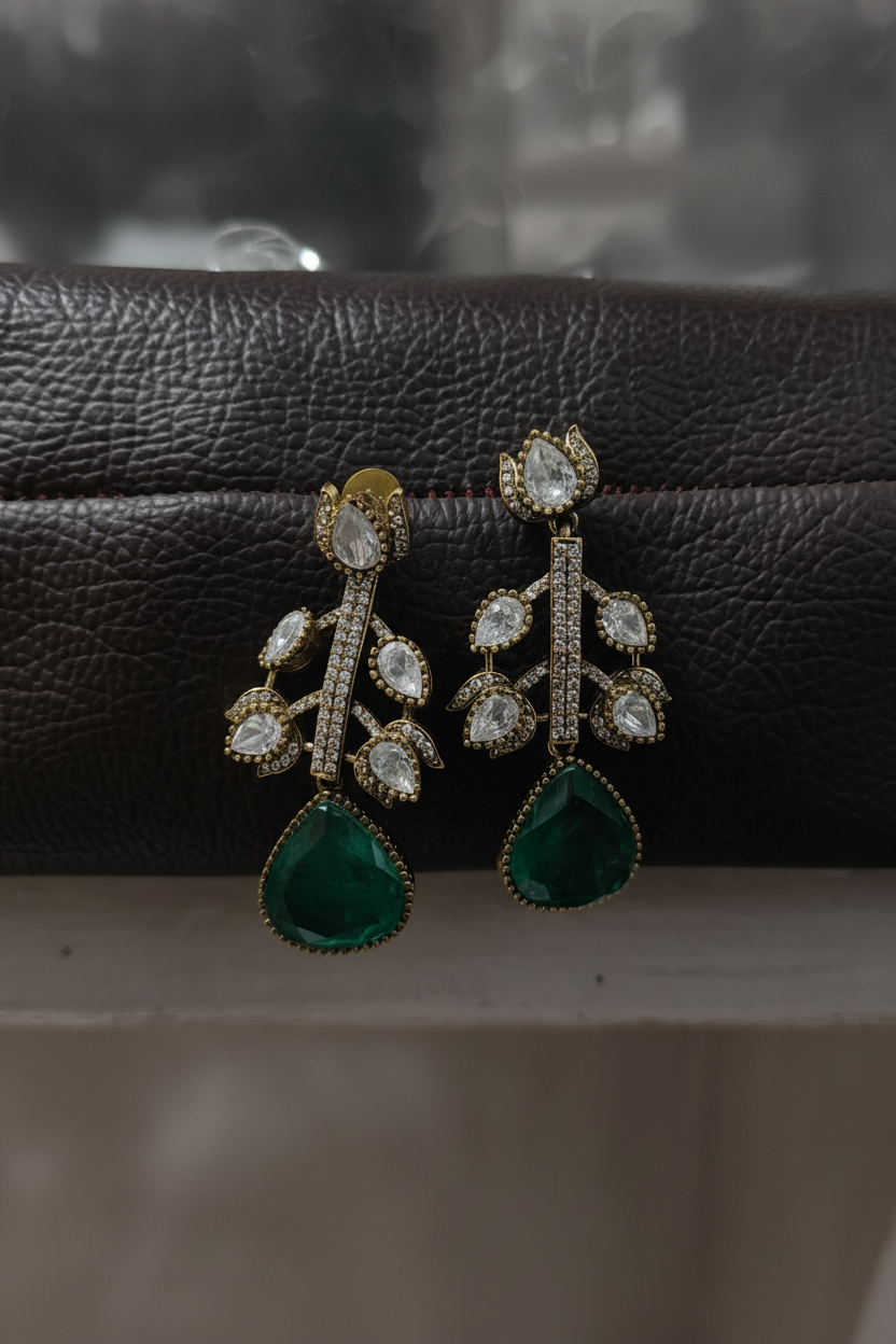 Polki Botanical Vine Emerald Drop Earrings – dark velvet luxury editorial promotional image