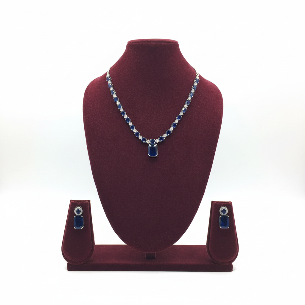 Royal blue sapphire AD tennis necklace set on burgundy velvet display
