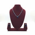 Royal blue sapphire AD tennis necklace set on burgundy velvet display