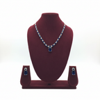 Royal blue sapphire AD tennis necklace set on burgundy velvet display
