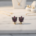 CZ Cat Face Bell Drop Earrings – luxury flat lay on marble