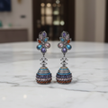 Multicolour CZ Fan Crown Jhumka Earrings – luxury flat lay