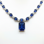 Close-up macro of sapphire oval stones and rectangular pendant