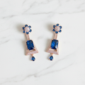 Rose Gold AD Sapphire Blue CZ Trapezoid Earrings - Studio Promotional Shot