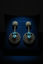 Gold AD Circular Chandelier Drop Earrings – dark velvet luxury editorial promotional image