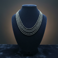 Hematite necklace on dark velvet studio display