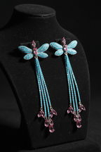 Turquoise Dragonfly Tassel Drop Earrings – dark velvet luxury editorial promotional image