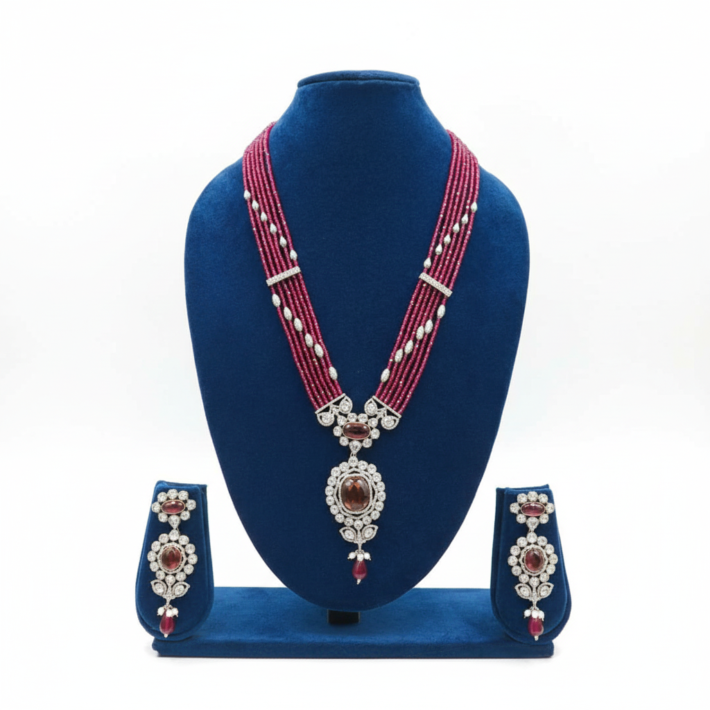 Ruby pink bead and pearl polki AD oval pendant long necklace set on navy velvet display