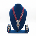 Ruby pink bead and pearl polki AD oval pendant long necklace set on navy velvet display