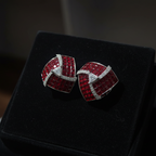 Ruby Swirl AD Earrings – dark velvet luxury editorial promotional image