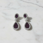 Amethyst Purple White CZ Double Teardrop Earrings – luxury flat lay on marble