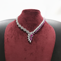 Pink ruby leaf AD necklace set on burgundy velvet display