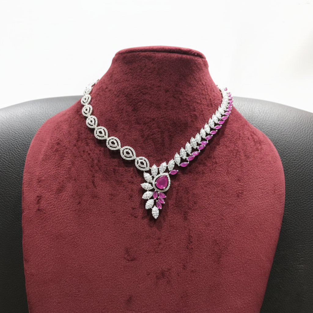 Pink ruby leaf AD necklace set on burgundy velvet display