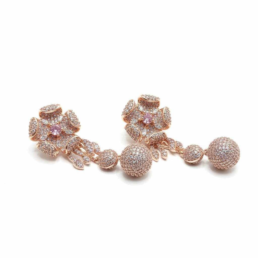 Rose gold floral AD earrings with pavé ball drops on white background