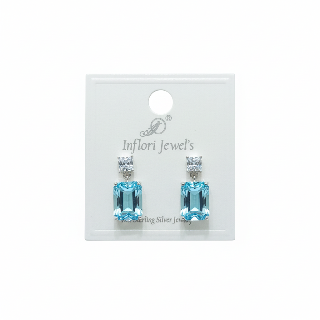 92.5 Sterling Silver Aqua Blue Rectangular CZ Drop Earrings studio promotional shot