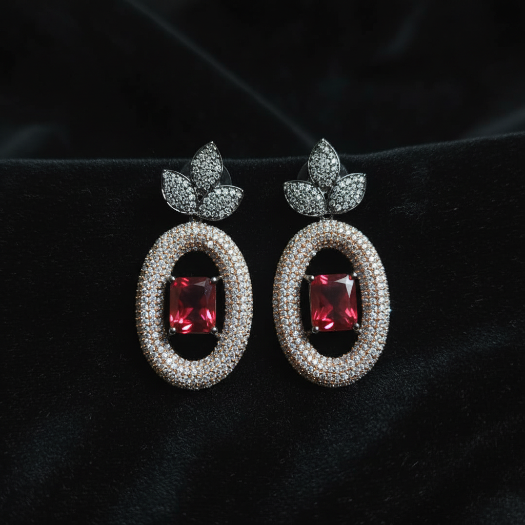 Ruby pavé oval halo drop earrings editorial promotional image on black velvet