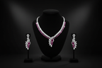 Pink ruby leaf AD necklace set promotional banner on black background