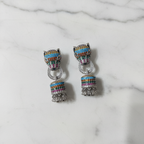 Rainbow CZ Panther Jhumka Earrings – luxury flat lay on marble
