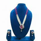 Ruby pink bead and pearl AD shield pendant long necklace set on navy velvet display
